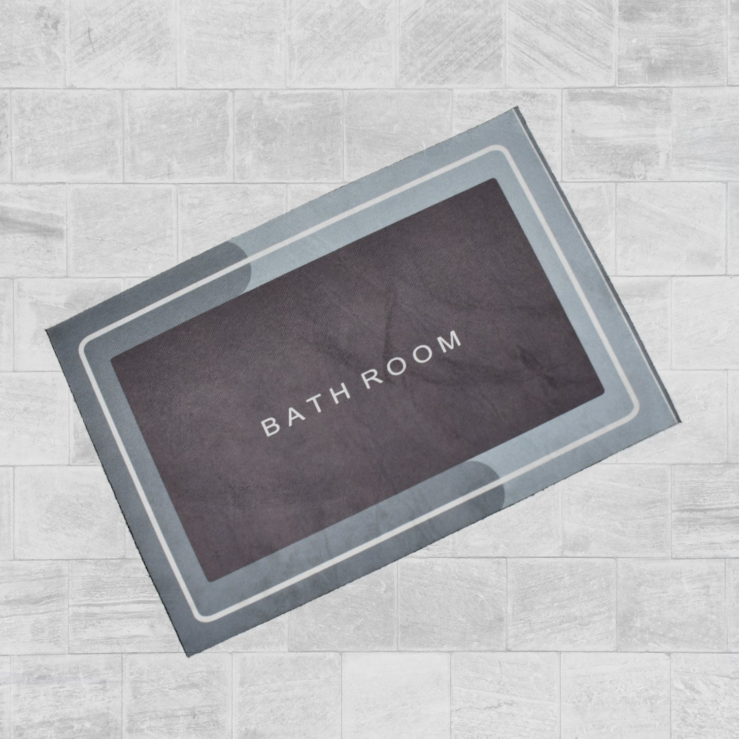 Water absorbent bathroom mat in grey. Water absorbent bathroom mat in grey.